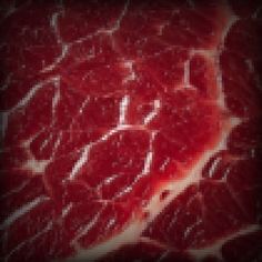 an image of some red meat in the middle of it's structure and texture