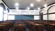 an empty classroom with wooden tables and chairs