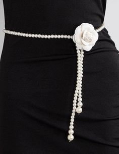 Steven Dann Pearl Camellia Waist Belt in Pearl. 41.5" costume pearl strand. Silver tone claw clasp closure. Completely adjustable. Can be worn as necklace or belt. Removable white felt camellia pin. Pearl Outfit, Resort Accessories, Pearl Belt, Rococo Sand, Waist Jewelry, Minnie Rose, Flower Belt, Pearl Strand, Kids Denim