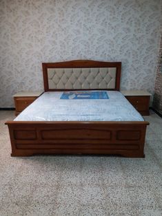 a bed sitting in the middle of a room