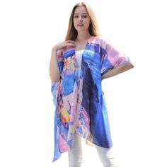 Blue and pink print kimono with the country of Greece printed throughout the garment. Great accent piece for any outfit. 34'' long from high point of shoulder to hem Fits sizes 2-16 100% cotton Hand wash cold water; dry flat Imported Summer Festival Blue Kimono, Blue Wrap Kimono For Summer, Blue Free Size Kimono For Spring, Blue Free Size Kimono With Kimono Sleeves, Long Multicolor Print Kimono For Spring, Summer Multicolor Print Kimono With Kimono Sleeves, Flowy Blue Open Front Kimono, Oversized Blue Kimono, Long Multicolor Print Summer Kimono