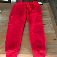 Nwt Size M Youth Sweatpants With Pockets Winter Casual Red Joggers, Red Cotton Full-length Sweatpants, Red Cotton Full Length Sweatpants, Sporty Red Sweatpants For Winter, Red Winter Pants With Pockets, Sporty Red Pants With Side Pockets, Red Cotton Winter Joggers, Red Joggers With Pockets, Sporty Red Joggers For Winter