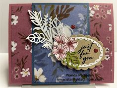 a close up of a card with flowers on it