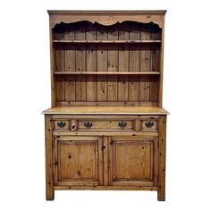 an old wooden hutch with drawers and cupboards on the front, isolated against a white background