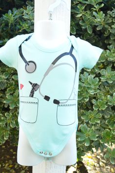 Dr or Nurse baby bodysuit or costume by doodledees on Etsy Fun Short Sleeve Onesie For Playtime, Fitted Cartoon Print Onesie For Playtime, Fitted Onesie With Character Print For Playwear, Fitted Character Print Onesie For Playwear, Cute Fitted Bodysuit With Cartoon Print, Cute Fitted Bodysuit For Playtime, Cute Character Print Onesie For Playwear, Cute Character Print Onesie For Play, Fun Onesie For Playtime