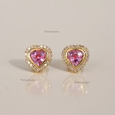 Heart Shape Pink Sapphire & Diamond Halo Mini Stud Earrings, Women Wedding Earrings, Bridal Earrings, Gift For Her, Handmade Jewelry, September Birthstone Earrings. Great Gift For Mom, Sister, Friend, Girlfriend and Daughter. Also available in Rose Gold, White Gold and Yellow Gold. 𝐏𝐫𝐨𝐝𝐮𝐜𝐭 𝐢𝐧𝐟𝐨: 𝟏𝟒𝐤 𝐬𝐨𝐥𝐢𝐝 𝐠𝐨𝐥𝐝 ★𝐃𝐞𝐭𝐚𝐢𝐥𝐬 ★𝐒𝐊𝐔 𝐂𝐨𝐝 : 2711 ★𝐏𝐮𝐫𝐢𝐭𝐲 : Solid 14k Gold ( Also available in 9k & 18k Solid Gold) ★𝐌𝐞𝐭𝐚𝐥 : Yellow Gold ( Also available in Rose Gold Yellow Gold Heart Earrings With Prong Setting For Wedding, Wedding Heart Earrings In Yellow Gold With Prong Setting, Wedding Yellow Gold Heart Earrings With Prong Setting, Heart Cut Yellow Gold Diamond Earrings For Valentine's Day, Heart Cut Yellow Gold Diamond Earrings For Weddings, Wedding Heart Cut Yellow Gold Diamond Earrings, Pink Heart-shaped Gemstone Earrings, Pink Heart Gemstone Earrings, Gold Diamond Earrings For Wedding On Valentine's Day