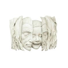 two white faces with hair on them