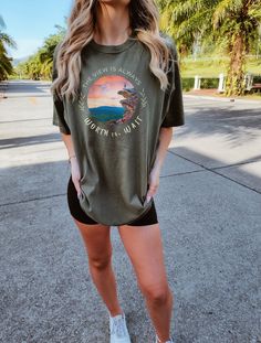 "Get ready to be OBSESSED with your new oversized hiking views shirt. It's the cutest and most trendy way to emit all those important granola girl vibes! This is the perfect camping lover tshirt! Great as a hiking lover gift! 🌈SHOP SIMILAR ITEMS↓ etsy.com/shop/BrightDogInspiration | https://www.etsy.com/shop/BrightDogInspiration?ref=seller-platform-mcnav * Q U I C K * F A C T S * ✺ 100% ring-spun cotton ✺ Relaxed fit ✺ Medium fabric (6.1 oz/yd² (206.8 g/m ✺ Sewn-in twill label ✺ Wash and dry normally (on cool heat or line dry for best results) * DETAILS* ✺ DTG Printing is used for our shirts, sweatshirts, and hoodies ✺ We stress that you check the sizing chart before purchasing ✺ DTG PRINTING:: Designs are printed directly on the garment using DTG (direct to garment) to ensure a long-last Casual Short Sleeve T-shirt For Adventure, Casual T-shirt For Outdoor Spring Activities, Casual T-shirt For Outdoor Spring Events, Casual T-shirt For Spring Outdoor Activities, Short Sleeve Tops For Outdoor Spring Activities, Short Sleeve Tops For Spring Outdoor Activities, Short Sleeve Tops For Spring Outdoors, Short Sleeve Tops For Spring Outdoor, Short Sleeve Tops For Spring Outdoor Events