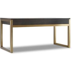 a wooden table with metal legs and a black top, against a white background that has gold trim around the edges