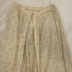 Vintage Skirt Size: small waist: 26” length: 45.5” Flared Skirt With Fitted Waist And Lining, Elegant Full-length Cotton Skirt, Traditional Fitted Skirt For Spring, Fitted Beige Skirt With Elastic Waistband, Beige Fitted Skirt With Elastic Waistband, Full-length Lined Cotton Skirt, Full-length Cotton Lined Skirt, Full Length Cotton Lined Skirt, Fitted Beige Maxi Skirt With Elastic Waistband