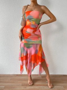 This Summer Vibes dress will elevate your summer wardrobe with its vibrant tie-dye print and flirtatious ruffled hem. The strapless design is perfect for sunny days, and the lightweight fabric ensures maximum comfort. Channel your inner fashionista with this trendy and versatile dress. Color : Multicolor Style : Boho Style : Sexy Pattern Type : Tie Dye Details : Ruched Sleeve Length : Sleeveless Details : Asymmetrical Neckline : Strapless Details : Split Thigh Type : Bodycon Waist Line : Natural Hem Shaped : Asymmetrical Hem Shaped : Mermaid Hem Shaped : Slit Length : Midi Fit Type : Regular Fit Fabric : Slight Stretch Material : Knitted Fabric Composition : 100% Polyester Care Instructions : Machine wash, do not dry clean,wash with the soft detergent Sheer : No Size US Bust Hip Size Lengt Strapless Summer Dress With Ruffle Hem, Strapless Dress With Ruffle Hem For Summer, Casual Strapless Dress With Ruffle Hem For Summer, Summer Strapless Dress With Ruffle Hem, Ruched Strapless Sundress For Summer, Fitted Strapless Dress With Ruffle Hem For Vacation, Summer Beach Strapless Dress With Ruffle Hem, Summer Beach Strapless Dress With Ruffles, Strapless Ruched Summer Dress