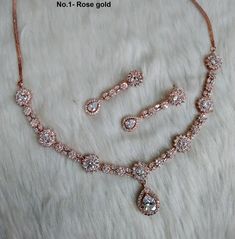 *rose gold , silver CZ necklace Set with earrings and tikka shown in the pic. *Adjustable length *Handmade item Rose Gold Hand Set Jewelry Sets For Celebration, Hand Set Rose Gold Jewelry Sets For Celebration, Silver Jewellry, Necklace Set With Earrings, Artificial Jewellery, Cz Necklace, Jewellery Necklace, Jewelry Statement, Bridal Necklace