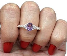 Amethyst Ring, size 8, Sterling Silver, Infinity Ring, Purple Gemstone, Oval Faceted, February Birthstone, Protection Stone, Powerful Stone  Divine oval faceted Amethyst Ring in a 4 prong setting  Clear CZ's sit on each shoulder   Infinity symbols adorn the band ♾  The 925 Sterling Silver (stamped) GA for Gemz Australia  Size 8 US Size Q AUS  Amethyst measures 7 mm by 6 mm, 5 mm depth 2.9 grams 1 carat  Comes with a Gift Pouch Pick up Augustine Heights or can post Australia / World wide for free Adjustable Oval Rings With Gemstone Accents, Oval Amethyst Ring For Anniversary, Oval Amethyst Rings With Stones, Oval Amethyst Ring With Stones, Oval Purple Ring With Stones, Silver Infinity Ring, Ring Purple, Infinity Ring, Protection Stones