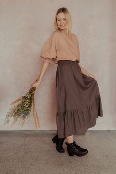 PEASANT linen skirt in Earth brown linen color size S. Long and wide comfortable skirt in pure linen. With bottom frill 12" (30 cm) high Waist elasticated Skirt length 92.5cm (36.5") Item quality - washed and softened On picture model of size S wears skirt in S size and Earth brown color linen Care recommendation: - delicate handwash machine program  - gentle detergents and no bleachers - iron if needed while damp. Size dimensions for size S SIZE S; US 4-6; UK 6-8 Bust: fits bust around 82-86 cm Solid Color Tiered Skirt For Brunch, Spring Brown Cotton Maxi Skirt, Casual Linen Tiered Skirt, Casual Linen Tiered Skirt Bottoms, Brown Cotton Maxi Skirt For Spring, Cotton Brown Maxi Skirt For Spring, Brown Spring Skirt, Brown Skirt For Spring, Solid Color Long Skirt For Brunch