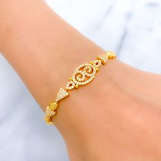 Indulge in luxury with our Graceful Fancy CZ Bracelet. Made with 22k yellow gold, this bracelet features stunning cubic zirconia stones and weighs 12.2 grams. Its elegant design and secure S lock make it a must-have accessory. Perfect for any sophisticated occasion. PRODUCT DETAILS Gold Purity(karat): 22k Item Weight(grams): 12.2 Item Finish: Yellow Gold Stone: Cubic Zirconia Bracelet Length: 6.75" Lock Style: S Lock 22k Gold Bracelet, Gold Bra, Gold Pearl Bracelet, Gold Chic, Black Beaded Bracelets, Cubic Zirconia Bracelet, Everyday Bracelet, Cz Bracelet, Lock Style