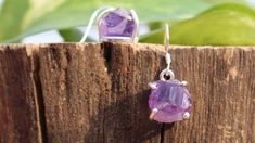 A pair of beautiful handmade Amethyst Drop & Dangle. The Amethyst stones used are raw. The Amethyst used is completely natural. Each stone is a true piece of Earth and hence it makes this pair of earring completely unique for you or your loved ones. This earring is handmade by our experienced silversmiths who have devoted their entire life to make such beautiful jewelry and setting up a perfect example of Indian craftsmanship. Earring Material: - 925 Sterling Silver Gemstone: - Amethyst  Hand-cr Handmade Purple Sterling Silver Earrings, Amethyst Earrings With Gemstone Accents, Gift, Handmade Purple Sterling Silver Gemstones, Handmade Purple Gemstones In Sterling Silver, Purple Gemstones With Sterling Silver Accents, Faceted Amethyst Earrings As A Gift, Faceted Amethyst Earrings For Gift, Amethyst Stones, Jewelry Sterling Silver