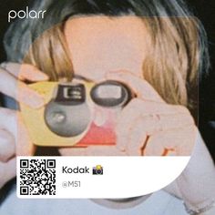 a person holding a cell phone up to their face with the text polar on it