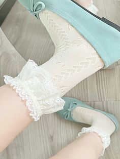 Add a touch of charm to your outfit with these adorable heart-patterned socks. Each pair is beautifully adorned with delicate lace trim at the cuff, adding a feminine and playful flair. Perfect for both casual and dressy occasions, these socks are a must-have for any kawaii or lolita fashion enthusiast.  Please note, the price includes one pair of socks only. Cute Lace Trim Socks For Spring, Cute Ruffled Socks For Spring, Cute Cream Socks For Spring, Cute Cream Spring Socks, Sweet White Socks For Spring, White Lace Trim Socks For Summer, Summer White Socks With Lace Trim, Fashion Enthusiast, Patterned Socks