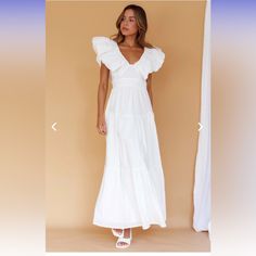 Never Worn - Perfect For Brides Or Summer Make A Statement In Our Gorgeous Kahlo Maxi Dress. Featuring A Bold Neckline And Maxi Length, It's Perfect For A Sunny Sunday Brunch With Your Besties. Team It With White, Strappy Heels And A Tote For A Look That Will Turn Heads. Day Out Maxi Dress With Puff Sleeves And Ruffles, Elegant Puff Sleeve Dress With Ruffles For Day Out, White Puff Sleeve Dress With Ruffles For Brunch, Puff Sleeve Ruffle Maxi Dress For Brunch, Chic White Puff Sleeve Dress For Garden Party, White Tiered Puff Sleeve Dress For Summer, Puff Sleeve Maxi Dress With Ruffles For Brunch, Chic Puff Sleeve Maxi Dress With Ruffles, White Puff Sleeve Maxi Dress For Day Out