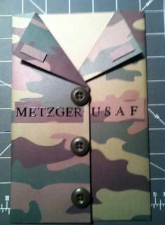 a close up of a piece of paper with buttons on it that says mitzer usa af