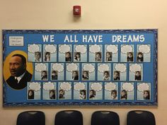 a bulletin board with pictures of martin luther king and the words we all have dreams