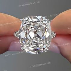 Handmade 20 CT Three stone cushion cut moissanite engagement ring,baguette&big large,old mine cut elongated cushion moissanite 3 stone wedding ring → Purchasing for: Engagement Ring, Wedding Ring, anniversary gift, Promise Ring, Diamond Ring  → Occasions: Engagement & Wedding DESCRIPTION  -------------------- ●𝐂𝐞𝐧𝐭𝐞𝐫 𝐒𝐭𝐨𝐧𝐞 𝐃𝐞𝐭𝐚𝐢𝐥𝐬 →Stone Type      :Moissanite - High Quality →Main Stone      :Old Mine Cushion →Size (mm)        :16*13 →Carat Weight   :20  ●𝐌𝐚𝐢𝐧 𝐬𝐭𝐨𝐧𝐞 𝐨? 3 Stone Wedding Ring, Edwardian Wedding Ring, Elongated Cushion Cut Engagement Ring, Big Diamond Rings, Cushion Cut Moissanite Engagement Ring, Moissanite Engagement Ring Cushion Cut, Stone Wedding Ring, Baguette Engagement Ring, Plus Size Rings