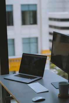 an open laptop computer sitting on top of a desk