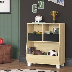 a child's room with a book shelf and toy bins