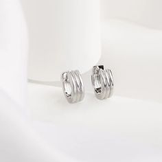 Triple Band Silver 8mm Baby Huggie Earrings | Wanderlust + Co Wanderlust And Co, Zodiac Jewelry, Colored Gems, Huggie Earrings, 925 Jewelry, Sensitive Ears, Huggies Earrings, Ring Necklace, Gold Vermeil