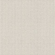 an upholstered white fabric textured with small dots