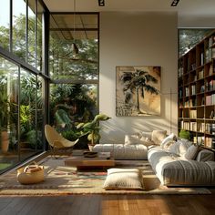 a living room filled with furniture and bookshelves next to a large glass window