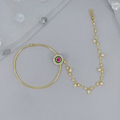 Look stunning with this gorgeous gold Kundan Bridal Nath/ Nose Ring with chain.  Enhace your either Modern or Traditional Bridal look.   Dimension:  6cm approx. We try to take photos as naturally as we can, but color can be slightly vary due to lighting.  Jewelry Care -- Keep all the jewelry away from water, perfumes, and other harsh chemicals Please note: No Returns No Exchange. But If you have any issue with your order, Kindly contact us before leaving a review Gold-tone Pearl Chain Wedding Jewelry, Gold Hoop Chain Jewelry, Gold Plated Hoop Jewelry For Wedding, Gold-plated Hoop Wedding Jewelry, Gold Plated Hoop Pearl Chain Jewelry, Gold Chain Earrings For Wedding, Traditional Gold Chain Jewelry For Wedding, Gold-tone Dangle Jewelry For Weddings, Gold-tone Wedding Jewelry With Adjustable Chain