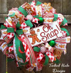 a christmas wreath with the words, oh snap on it and an image of a gingerbread