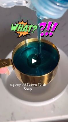 a person pouring liquid into a bowl with soap on the side and what? sign above it