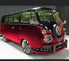 the vw bus is painted red and black