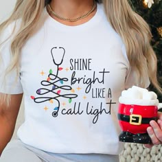 This Nurse Christmas Shirt is a perfect way to celebrate your favorite Nurse during Christmas! ✦KEY FEATURES:: .: 100% Airlume combed and ringspun cotton (fiber content may vary for different colors) .: Light fabric (4.2 oz/yd² (142 g/m .: Retail fit .: Tear away label .: Runs true to size ✦CARE INSTRUCTIONS:: Machine wash: warm (max 40C or 105F); Non-chlorine: bleach as needed; Tumble dry: low heat; Iron, steam or dry: medium heat; Do not dryclean. .:DISCLAIMER: Product color may slightly vary Christmas Healthcare Shirts, Cute Healthcare Shirts, Cute Nurse Shirts Ideas, Healthcare Shirt Ideas, Christmas Nurse Shirts Vinyl, Medical Shirt Ideas, Nurse Tee Shirts Ideas, Cricut Nurse Shirts, Lpn Shirt Ideas