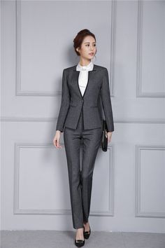 If you are looking forward to making heads turn at work, get home this set of Pantsuit with Jacket. Made from cotton, microfiber, and polyester, this pantsuit set is available in black and grey color. It is perfect workwear for ladies who are looking for something comfortable and stylish. With a smooth finish, this pantsuit and jacket set is a perfect autumn-winter wear.

Specifications
Gender: Women
Item Type: Pant Suits
is_customized: Yes
Clothing Length: Regular
Closure Type: Single Breasted Work Outfits Frauen, Office Attire Women, Business Professional Outfits, Look Office, Womens Suits Business, Office Outfits Women, Pantsuits For Women, Work Outfits Women, Formal Outfit