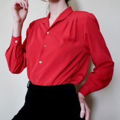 This Vintage Worthington Industries Blouse Is A Stunning Addition To Any Wardrobe. The Bright Red Color Is Eye-Catching And The Original Tags Add A Touch Of Nostalgia. Made In The 1980s, This Blouse Is A Unique Piece Of Fashion History. It Features A Classic Design And Is Perfect For Anyone Looking To Add Some Vintage Charm To Their Outfit. Whether You're A Collector Or Just Love The Look Of Vintage Clothing, This Blouse Is A Must-Have. Don't Miss Out On This One-Of-A-Kind Piece! Red Vintage Tops For Fall, Classic Red Blouse For Fall, Vintage Red Long Sleeve Blouse, Vintage Red Blouse For Fall, Fitted Red Vintage Blouse, Red Retro Blouse, Classic Red Collared Blouse, Retro Red Blouse For Spring, Classic Red Spring Top