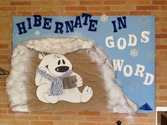 a sign that says hibernate in god's word with a polar bear holding a book