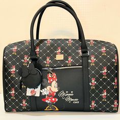 Brand New With Tags. Color Black Disney Minnie Mouse Duffel Weekender, Travel Bag With Minnie Ears Coin Purse. This Duffel, Weekender, Overnight, Or Carry On Bag Is A Great Gift For Disney Fans On The Go! Adjustable Long Shoulder Strap Attachment Roomy Open Interior With Interior Zip Pocket Exterior Front Pocket Disney Silver D Shaped Bag Charm Measures Approximately 11” L 18” W 8" D Black Minnie Mouse Bag For Disney Trips, Black Disney Rectangular Bag, Black Minnie Mouse Bag For Everyday Use, Black Mickey Mouse Bag For Disney Fan Events, Black Minnie Mouse Travel Bag, Black Mickey Mouse Travel Bag, Minnie Mouse Bags For Disney Trips, Duffle Bag With Wheels, Small Coin Pouch