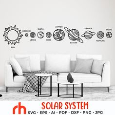 the solar system wall decals are shown in this living room