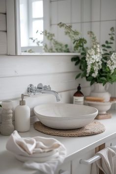 Explore charming farmhouse half bath ideas featuring rustic decor and cozy details. See how to elevate your small bathroom with unique designs that blend function and style. Farmhouse Half Bath, Statement Light Fixture, Rustic Vanity, Bath Inspiration, Best Paint Colors, Warm Colour Palette, Chic Bathrooms, Statement Lighting, Cozy Farmhouse