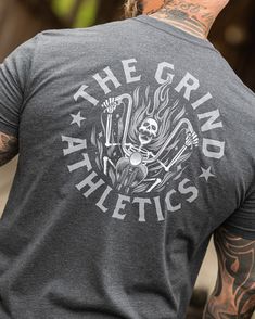 The Grind Athletics Freedom Rider Sports T-shirt With Back Print And Crew Neck, Sports Cotton T-shirt With Back Print, Gray Graphic Print Sports T-shirt, Urban Style Graphic T-shirt For Gym, Urban Graphic Print T-shirt For Gym, Urban Style Gym T-shirt With Graphic Print, Urban Style Graphic Print Gym T-shirt, Athletic Heather Graphic Print T-shirt, Athletic Heather Graphic Tee With Print