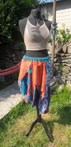 Bohemian Patchwork Skirt For Festival, Bohemian Festival Skirt With Patchwork, Bohemian Skirt For Festivals, Bohemian Festival Skirt, Bohemian Multicolor Wrap Skirt For Beach, Bohemian Long Skirt For Festival, Bohemian Green Wrap Skirt For Festival, Hippie Style Flowy Wrap Skirt For Festival, Bohemian Multicolor Sarong For Festivals