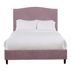 a bed with white sheets and pillows on top of it's headboard, in front of a white background