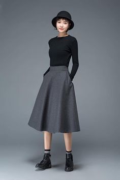 The winter skirt is made of gray wool blend and polyester, it has a polyester lining.This grey skirt has two pockets. It has some elastic in the back of waist.This wool skirt is closed by a right side zipper.I suggest dry clean for winter wool clothing, it is good for save clothing. you also can wash by your hand if you want.___________________________________SIZEAvailable in sizes XS-XXLHow to choose size ?1.Check your body measurement with instructionshttps://www.etsy.com/listing/7940540802.Ge Gray Flared Skirt For Work, Gray Flared Workwear Skirt, Gray Lined Midi Skirt, Gray Midi Skirt For Work, Fall Gray Skirt With Pockets, Winter Pleated Midi Skirt, Winter Midi Length Pleated Skirt, Winter Midi Pleated Skirt, Gray Full Skirt For Workwear