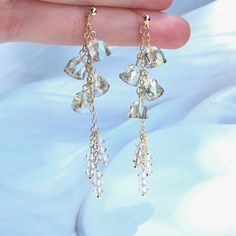 👂PRODUCT DETAILS  Crystal Wind Chime Earrings by ELEVEN11DREAM - Material: High-Quality Swarovski Crystal and 14Kgold Plated - Size: Length 7in.  /width2.95in.     Length 2cm /width0.78cm - Sold in pairs 🎈SHIPPING - All orders will be shipped within 1-3 business days after the order has been received - Ship all orders via USPS First-Class Mail - FREE SHIPPING for all USA domestic orders 💖PLEASE READ THE PRODUCT DESCRIPTION - All products are made by my hand with love and care in my studio - All products are nicely packaged in a protected clear box or bag to avoid damage - Keep your jewelry away from water or any liquid chemicals to avoid discoloration (for example, swimming or bathing) - Safely store your jewelry in a jewelry box or airlock bag 🔴RETURNS, REFUNDS&EXCHANGES If you would Single Crystal Earring As A Gift, Crystal Drop Earrings As A Gift, Crystal Chandelier Earrings As A Gift, Sparkling Dangle Crystal Earrings Gift, Gift Sparkling Dangle Crystal Earrings, Crystal Dangle Earrings With Charms For Party, Crystal Chandelier Dangle Earrings, Crystal Dangle Chandelier Earrings With Ear Wire, Crystal Dangle Earrings For Gift