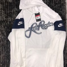 Brand New Nike Los Angeles Football Hoodie Size Large White & Blue Bq1655-100 $75 Urban Style White Sweatshirt For Sports, White Hooded Hoodie For College, White Hooded Outerwear For Sports Season, Nike White Hoodie For Fall, White Varsity Hoodie For Winter, White Varsity Sweatshirt For Winter, Urban White Sweatshirt For Sports, White Hoodie For College In Spring, White Hooded Top For College