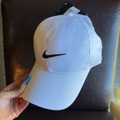 Nike Unisex Hat. White, Brand New! Perfect Condition, Hat Is Adjustable. Cheap Nike Adjustable Baseball Cap, Sporty White Adjustable Dad Hat, Sporty White Hat With Curved Brim, Adjustable White Dad Hat For Sports, Adjustable White Short Brim Dad Hat, White Sporty Visor Hat, White Baseball Cap Dad Hat For Spring, White Dad Hat Baseball Cap For Spring, White Dad Hat Visor For Spring