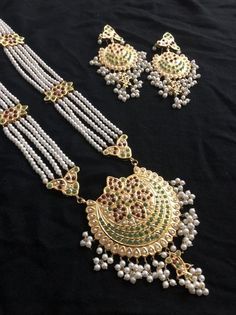 Kundan Jewelry For Eid Rituals, Bollywood Jewelry For Eid Rituals, Bollywood Style Jewelry For Eid Rituals, White Jewelry With Latkans For Eid, Traditional Jewelry For Eid Rituals, White Latkans Jewelry For Eid, White Chandbali Jewelry For Navratri, Elegant Kundan Jewelry For Rituals, White Meenakari Jewelry For Rituals